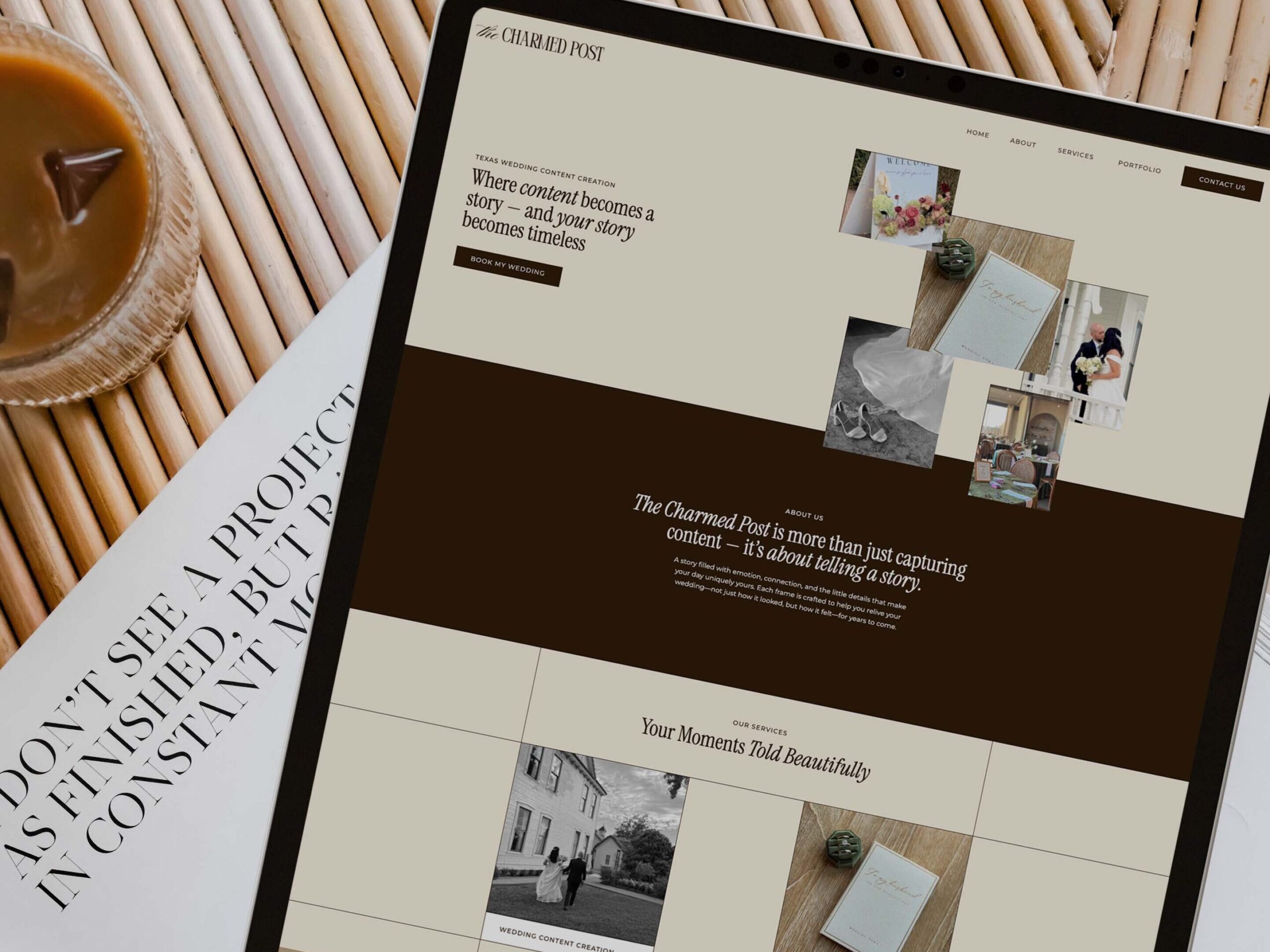 Tablet with a custom wedding content creator website on it while on top of a table with a cup of coffee
